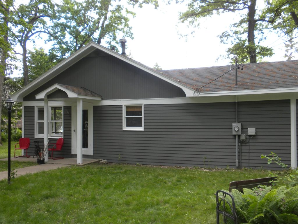 Green Lake lake house after painting: new gray siding with white trim, front