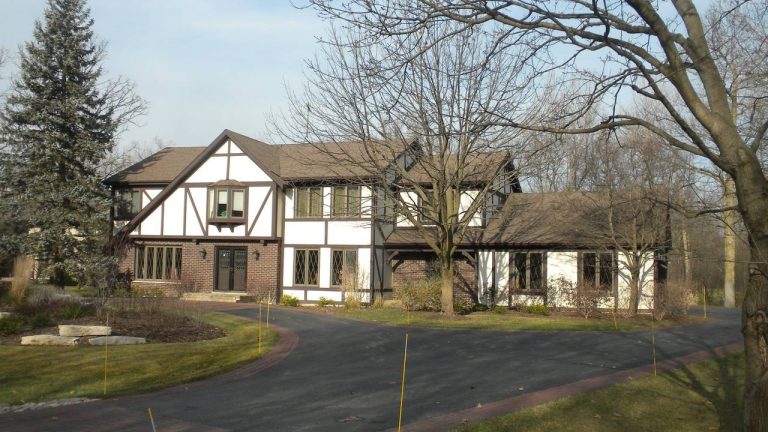 Tudor-style home exterior painted by Pete the Painter