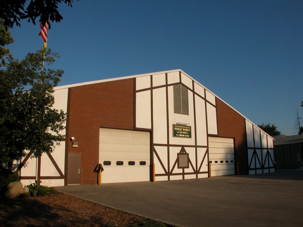 Repainted Northbrook Public Works garage with flag