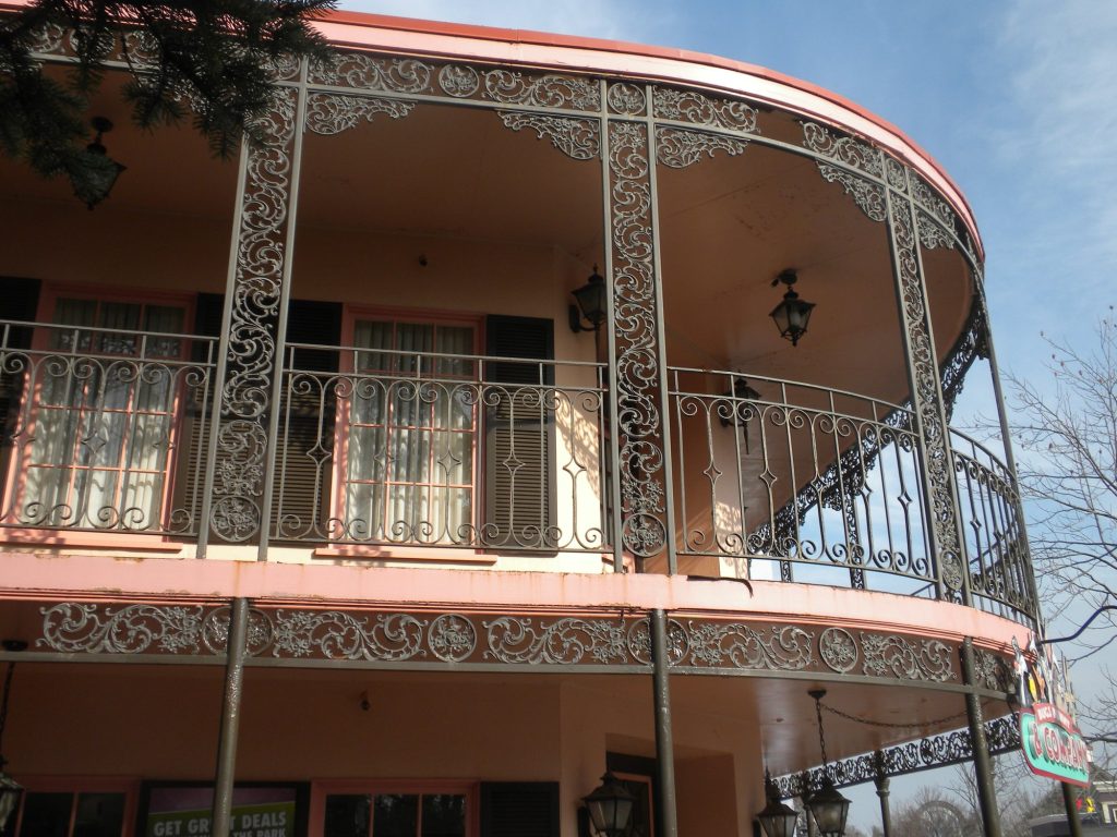 Curved balcony with painted iron railing at Six Flags Great America