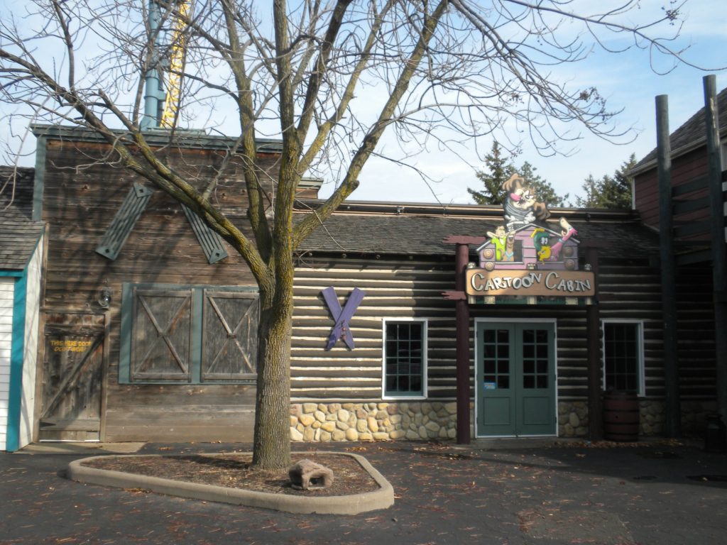 Log-sided Cartoon Cabin at Six Flags Great America after painting